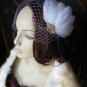 Feathers fascinator Gold
