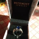 NIB  PIERMONT JEWELS-RING SIZE 5. BLUE GEM  silver color 4 little bluish green