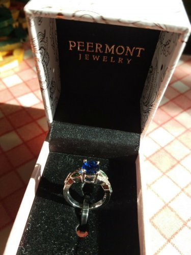 NIB  PIERMONT JEWELS-RING SIZE 5. BLUE GEM  silver color 4 little bluish green