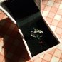 NIB  PIERMONT JEWELS-RING SIZE 5. BLUE GEM  silver color 4 little bluish green