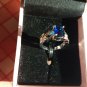 NIB  PIERMONT JEWELS-RING SIZE 5. BLUE GEM  silver color 4 little bluish green