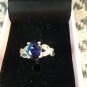 NIB  PIERMONT JEWELS-RING SIZE 5. BLUE GEM  silver color 4 little bluish green