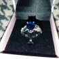 NIB  PIERMONT JEWELS-RING SIZE 5. BLUE GEM  silver color 4 little bluish green