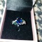 NIB  PIERMONT JEWELS-RING SIZE 5. BLUE GEM  silver color 4 little bluish green