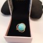 NIB  PIERMONT JEWELS-RING SIZE 8. Turquoise  color golden ring with diomend like