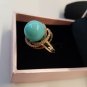 NIB PIERMONT JEWELS-RING SIZE 8. Turquoise color golden ring with diomend like