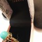 NIB PIERMONT JEWELS-RING SIZE 8. Turquoise color golden ring with diomend like