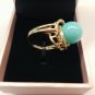 NIB PIERMONT JEWELS-RING SIZE 8. Turquoise color golden ring with diomend like