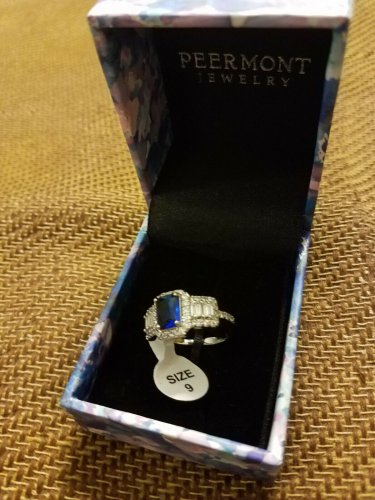NIB  PIERMONT JEWELS-RING SIZE 9. BLUE GEM  silver color sorounded diamond  like