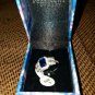 NIB PIERMONT JEWELS-RING SIZE 9. BLUE GEM silver color sorounded diamond like