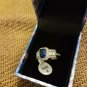 NIB PIERMONT JEWELS-RING SIZE 9. BLUE GEM silver color sorounded diamond like