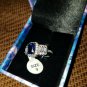 NIB PIERMONT JEWELS-RING SIZE 9. BLUE GEM silver color sorounded diamond like