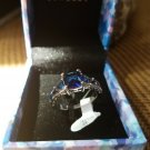 NIB  PIERMONT JEWELS-RING SIZE 9. BLUE GEM  silver color 4little blue gems sides