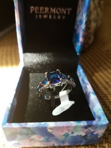 NIB  PIERMONT JEWELS-RING SIZE 9. BLUE GEM  silver color 4little blue gems sides