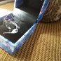 NIB PIERMONT JEWELS-RING SIZE 9. BLUE GEM silver color 4little blue gems sides