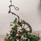 Wagon-wheel shelf-sitter with pink birds