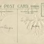 Vintage Christmas Postcard Winsch Back  Embossed Poinsettias framing snow scene Gold background