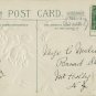 1910 Vintage Embossed New Years Postcard Winsch back Yellow Roses Snow covered church