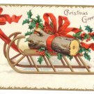 Signed Clapsaddle Yule Log Sled 1907 UND Vintage Embossed Gilt Christmas Postcard