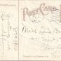 Christmas Angel with Palm Branch Flying over Snowy Town Embossed Vintage Postcard 1910