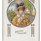 Embossed Birthday Greetings Woman Fancy Hat Behind Wheel of Car Gilded Postcard