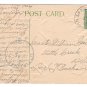 Happy New Year 1911 Holly Man by Fence in Winter Scene Vintage Embossed Postcard