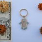 Hamsa spinning keychain with safe journey bless Israel