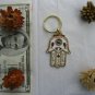White Hamsa keychain with safe journey bless mazal luck from Israel