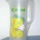 Plastic jug with plastic glasses inside
