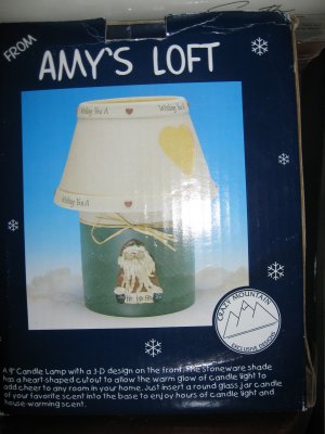 Candle lamp with a 3D design on the front