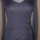 Grey top with silver flower on the bottom
