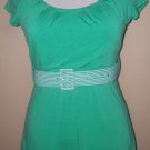 Green top with striped belt