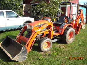 2005 Kioti Tractor with front loader and backhoe
