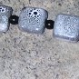 A1-White/Black Flecked Bracelet