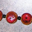 A6-Red Ceramic with Black Beaded Bracelet