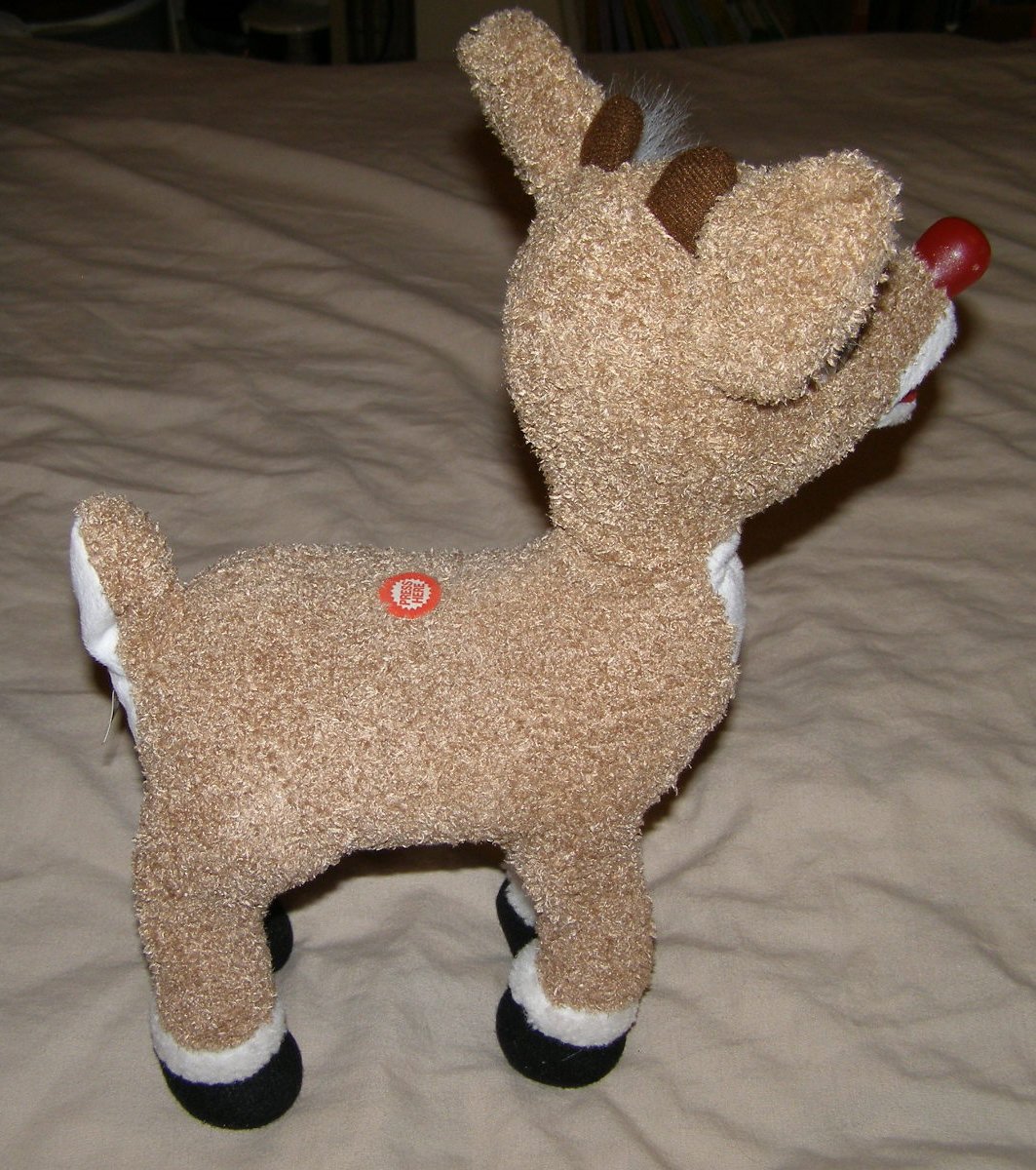 singing rudolph stuffed animal
