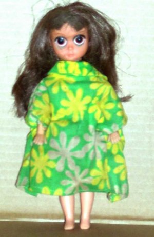 Small Doll with Green and Yellow Dress