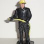 Vintage Remco 1987 Plastic Black and Yellow Fireman with Hose Figure Loose Used