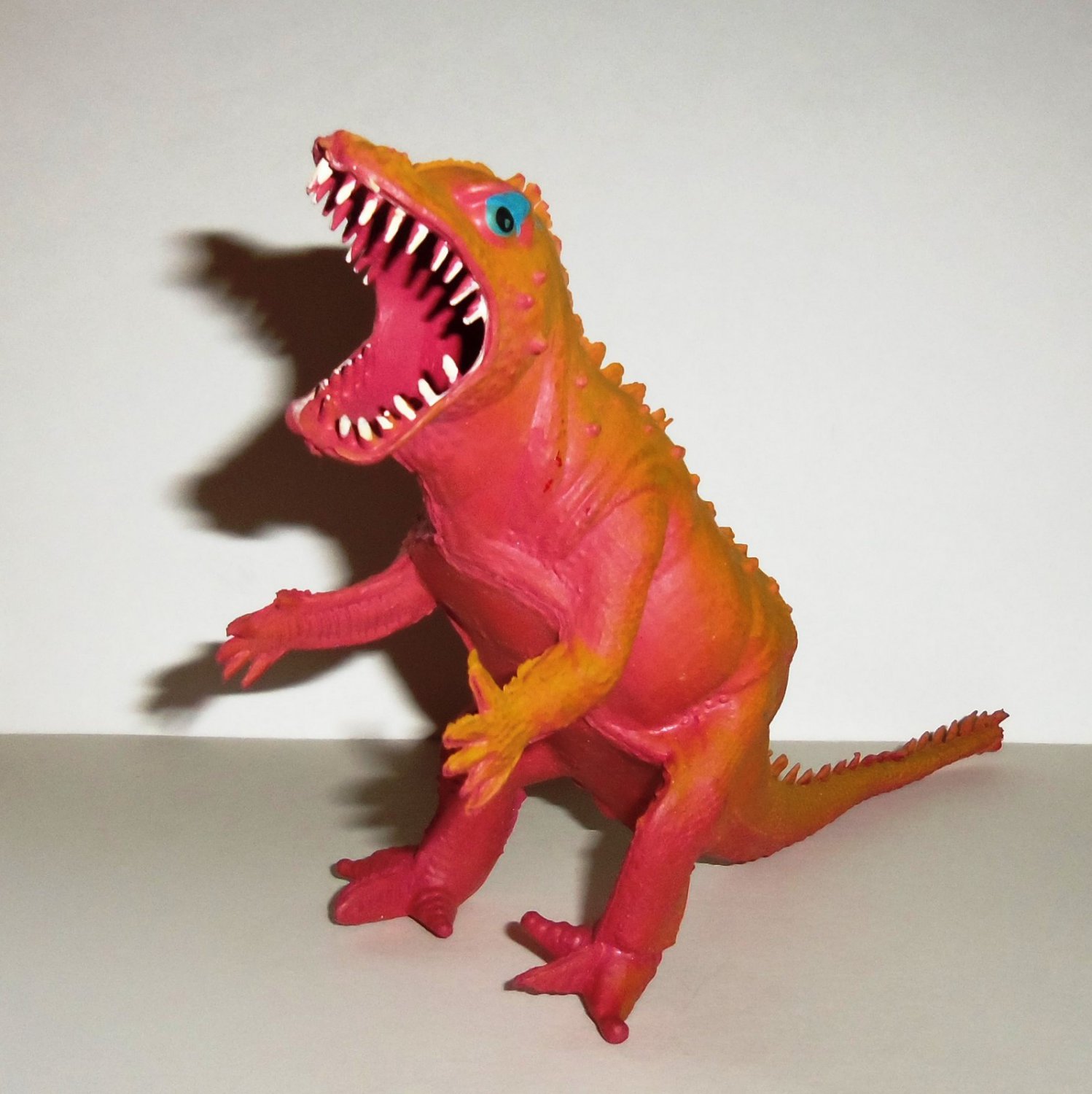 orange colour dinosaur