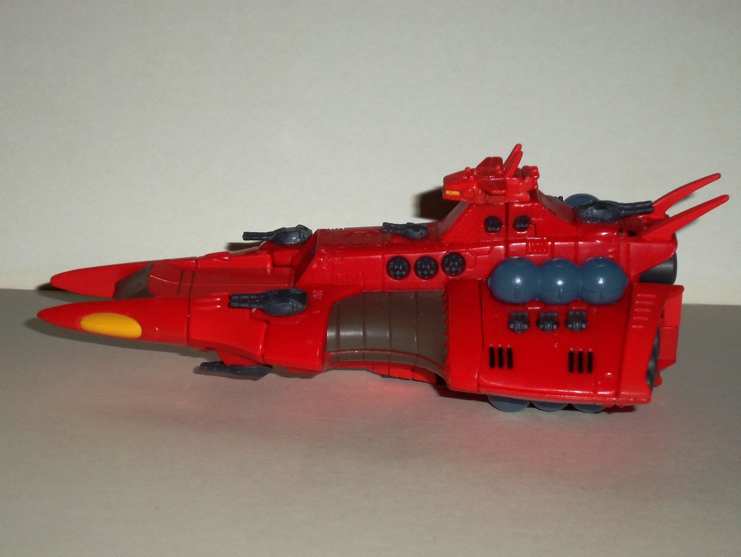 red rocket ship toy