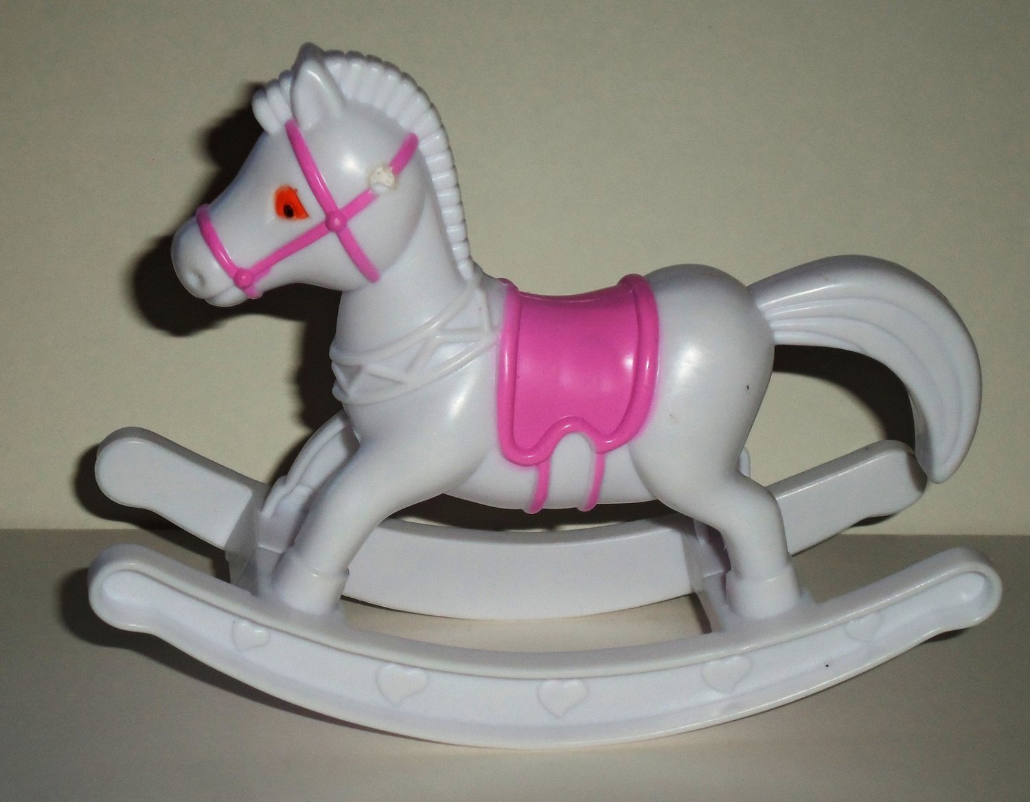White and Pink Plastic Rocking Horse for Dolls Loose Used