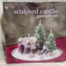 Sculpted Candle Garden Set a cottage, 2 Cmas trees and snowman w/plate 10" /25.40cm Dia Price:9.95