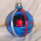HandCrafted Blue Glass Cmas Ball Ornament w/Red Stars & Red and Silver Ribbin Design Price: 3.95