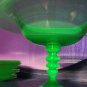 Green glass compote Glows