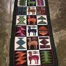 Hand-weaved colorful rug from Peru, green runner with Inca signs