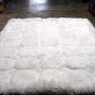 White alpaca fur rug with Octagon designs, from Peru, 80 x 60 cm