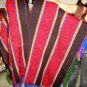 Typical peruvian red Poncho with stripes, Inca designs
