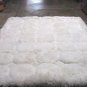 White alpaca fur rug with Octagon designs, 90 x 60 cm