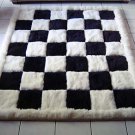 Designer alpaca fur rug, black and white, chess design, 190 x 140 cm