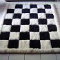 Designer alpaca fur rug, black and white, chess design, 220 x 200 cm